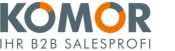 komor logo